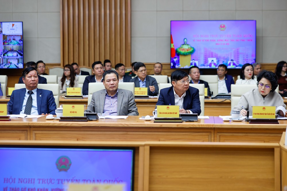 Các doanh nghiệp tham dự Hội nghị toàn quốc về tháo gỡ khó khăn, vướng mắc, thúc đẩy phát triển nhà ở xã hội chiều 6/3. Ảnh: VGP.